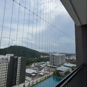 Solución de seguridad de malla transparente de baranda invisible que combina durabilidad y atractivo estético para edificios modernos