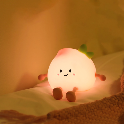 2024 Nueva lámpara de noche de forma de durazno de forma creativa Lámpara de escritorio suave de silicona 7 colores cambiantes cuidado de ojos Luz nocturna para niños Regalos lámpara de escritorio